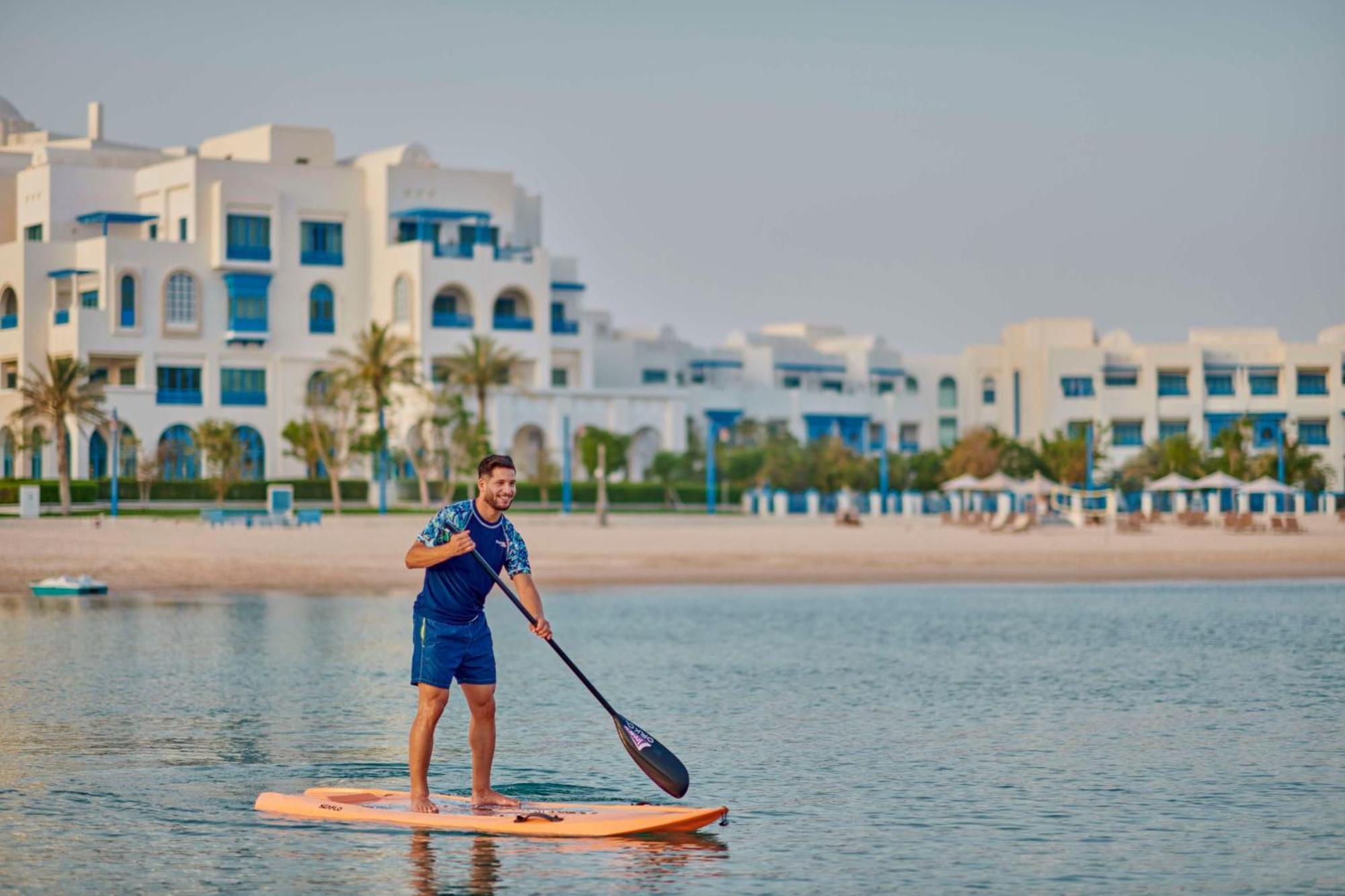 Hilton Salwa Beach Resort And Villas Abu Samra Εξωτερικό φωτογραφία Stand Up Paddle Boarding at Al Habtoor Polo & Equestrian Club